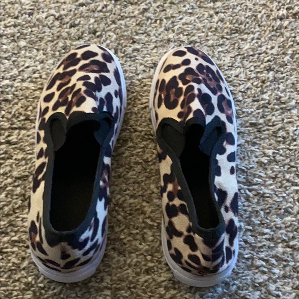 New in bag size 5.5 cheetah print slip on shoes